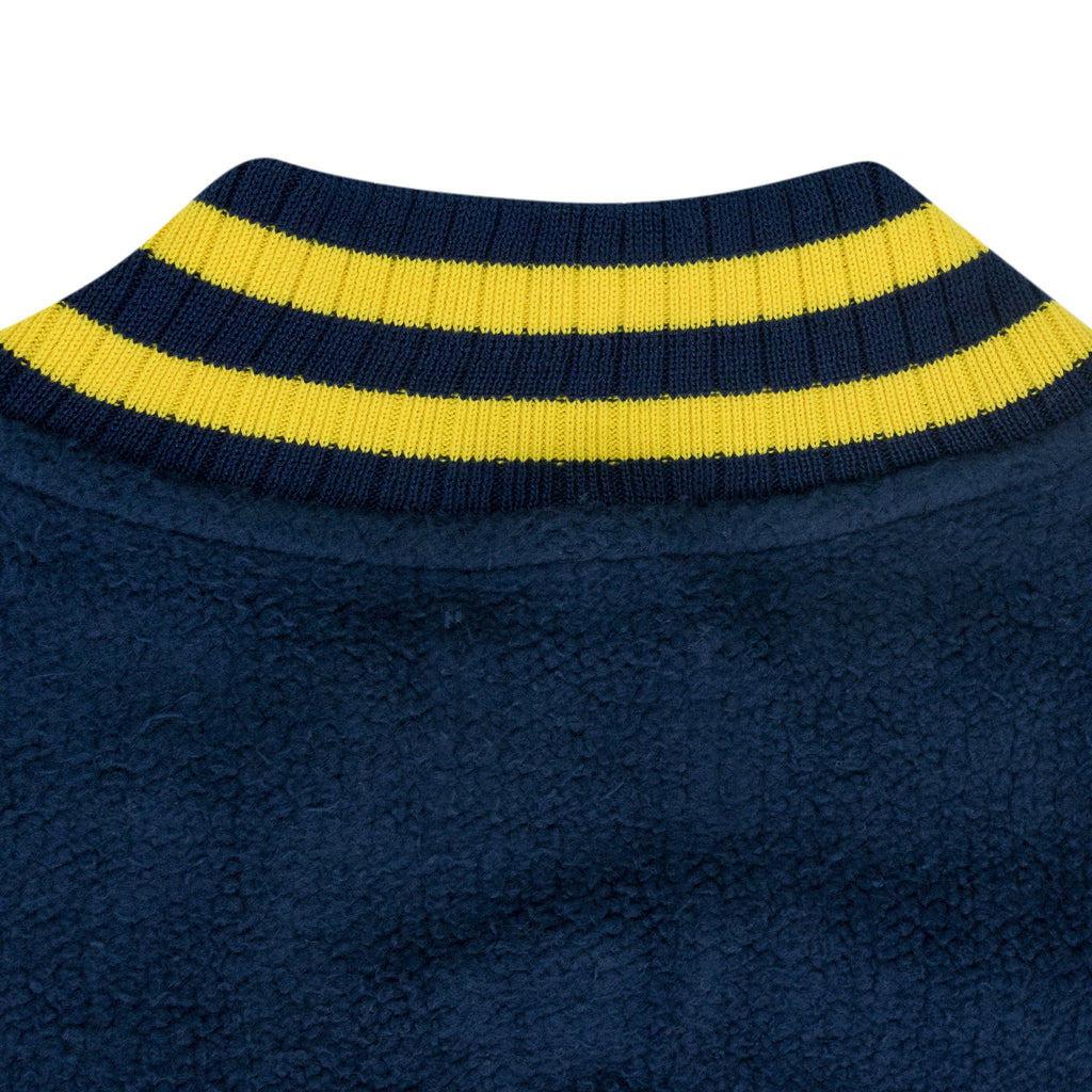 NAVY OVERSIZED LOGO TERRY VARSITY JACKET